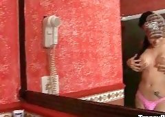 Kalena Rios drills chap in a bathroom