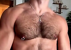 Muscled hunk sniffs own pits