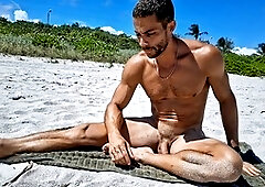 Athletic guy Andrearmani shows off his smooth bubble butt while doing nude yoga at a Rio beach