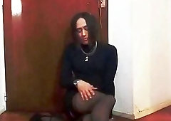 Shemale strips down to her sexy lingerie and rides dildo