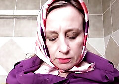 unattractive slender 72 years old grandma takes a soapy shower prolapse her large cervix and peeing in the bathtub