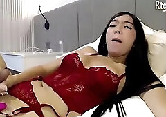 slender Japanese trans beauty in red lingerie and stockings wanks on webcam