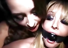 BDSM lezdom bitches with mouth gags kiss and get freaky