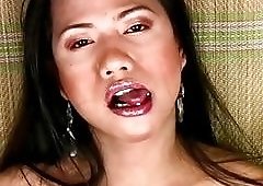 Brunette tranny undresses and plays with her cock