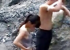 Chinese woman is having her first casual sex session in the nature, in the middle of the day
