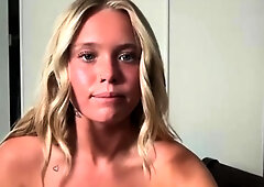 Blonde teen in solo action with her pussy