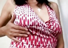 Slutty Cougar Rubs Her Breasty Melons And Masturbates