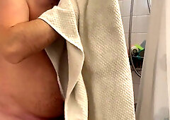 Fur covered Bearded Hairy man Showering