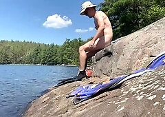 Aaron Sunbathes Nude