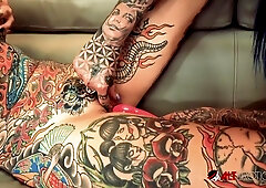 Tattooed babes Amber Luke and Tiger Lilly fuck each other with toys