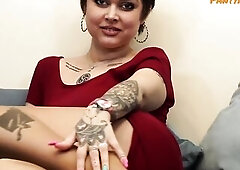 A light-skinned black playgirl that has tattoos and piercings uses a sex tool thru her sheer seamless hose to get off