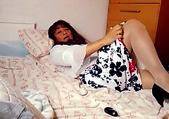 Jhazmeena showing off and having fun with her thrilling anal plug in bed