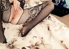Stockinged solo girl teases her pussy on webcam while watching lingerie porn