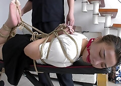 Slender Asian Girl With Sexy Legs Is Introduced To Bondage