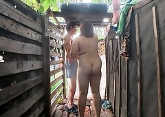See a pair have a fun fellatio-job in a rustic outdoor shower. Big bazookas, moist skin, wooden setting and natural outdoor feel. Medium intensity wit